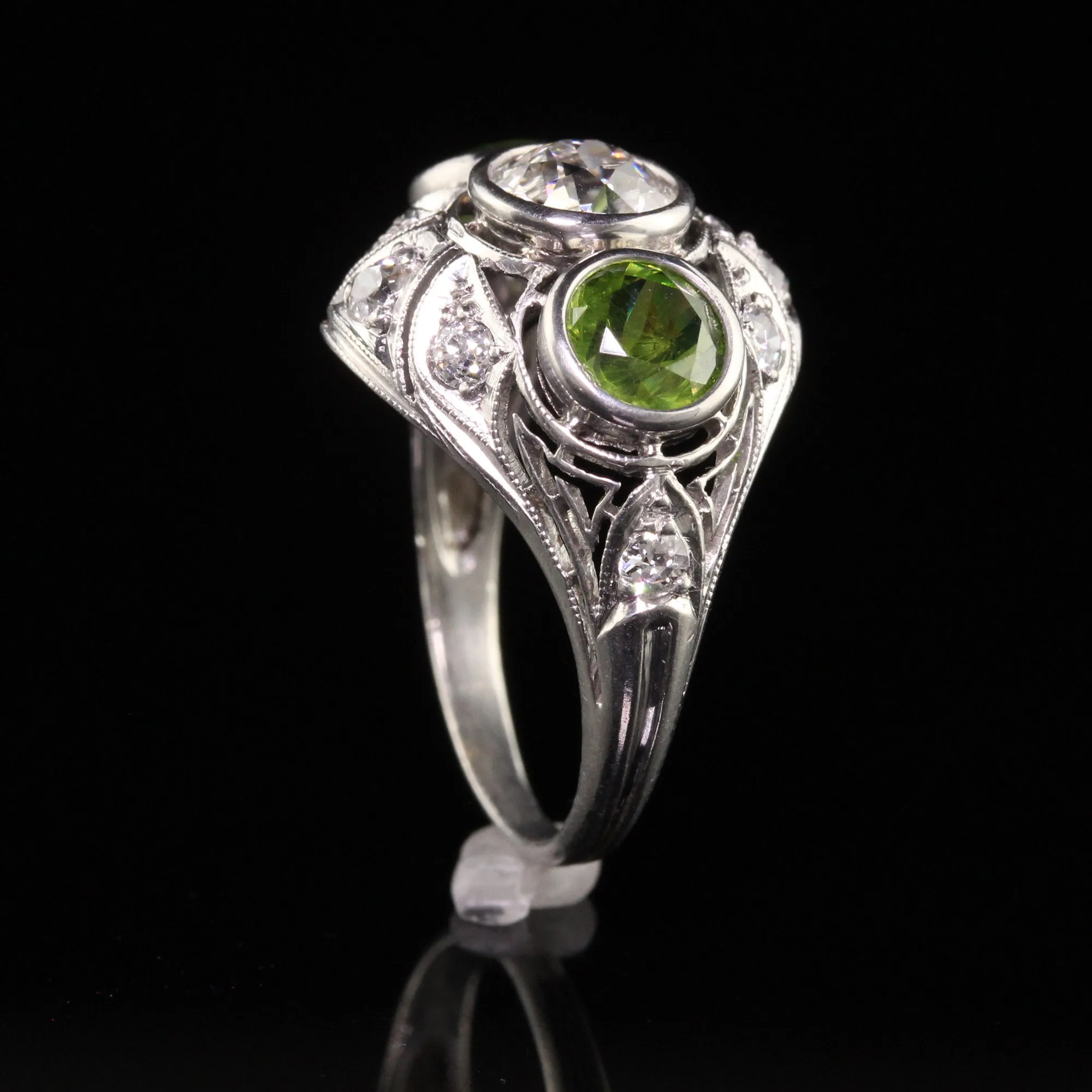 Antique Art Deco Platinum Demantoid Garnet and Diamond Three Stone Ring