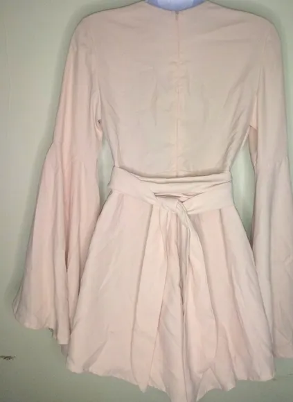Blush Run Around jumper with a deep drop with a v-neck front