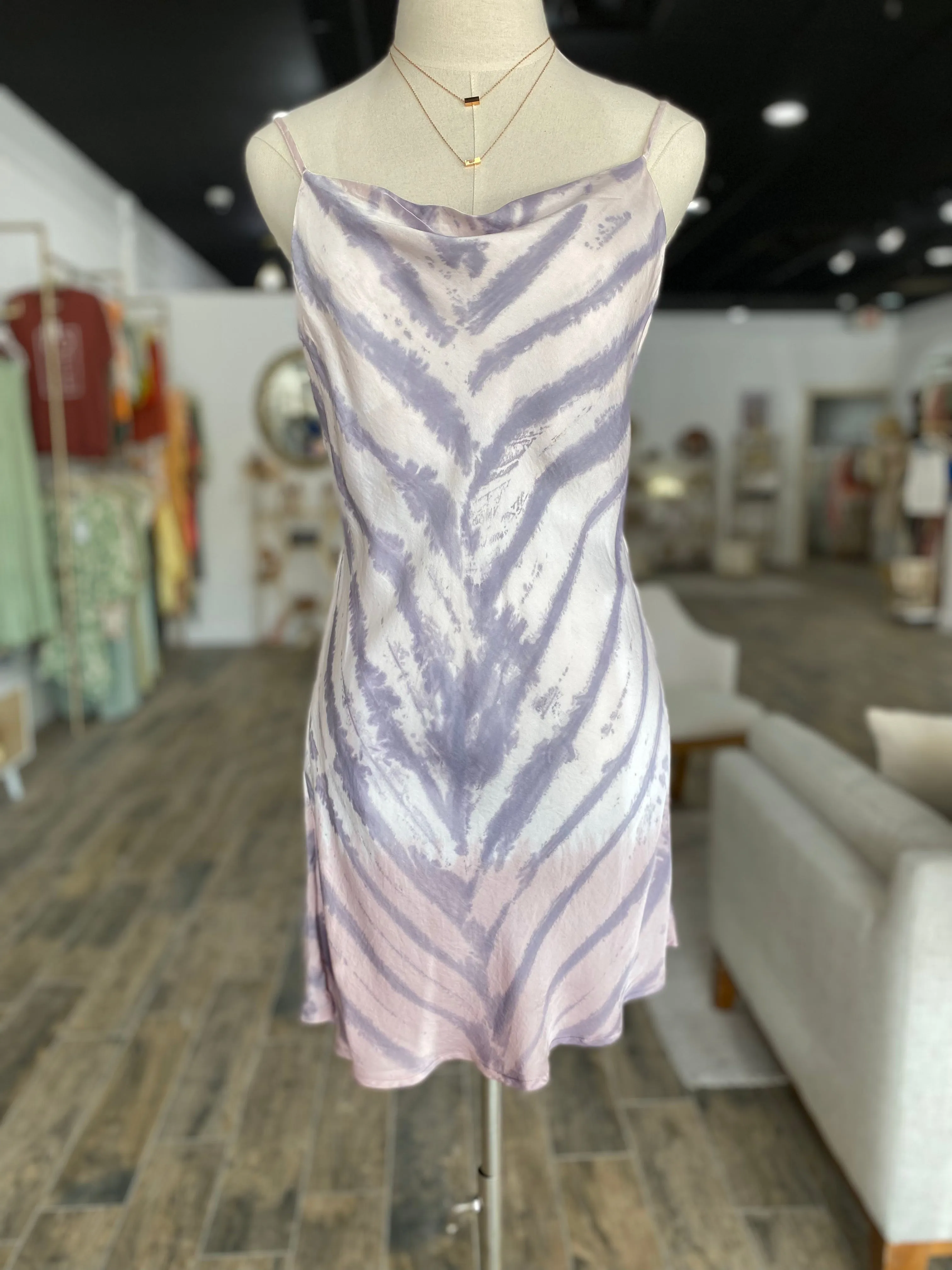 Print Mini Dress features a Cowl Neckline